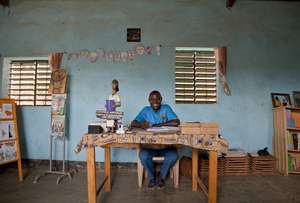 Alidou, the librarian, at his desk