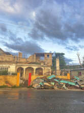 Dec. photo of destruction, debris and cleanup