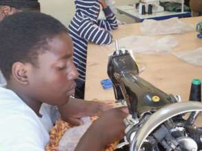 Young person sewing