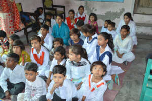 1st grade sitting on the floor