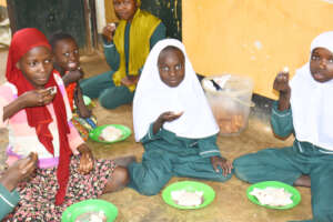 SUPPORTED ORPHANS HAVING MEALS