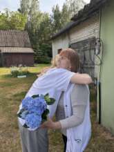 A hug that means more than material aid