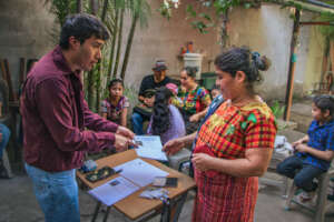 Mother receiving her child's school control card