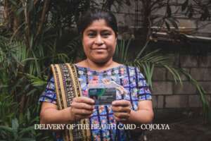 Artisan receiving her health card