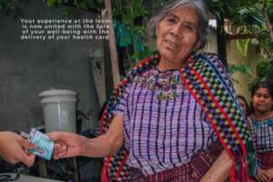 Artisan receiving her health card 2025