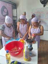 Our food bank families learning healthy recipes.