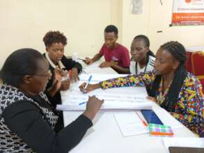 Volunteers train as Business course facilitators