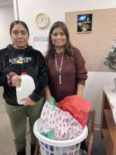 Immigrant lady received Food basket from LAMP