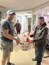 Immigrant Family receiving food basket