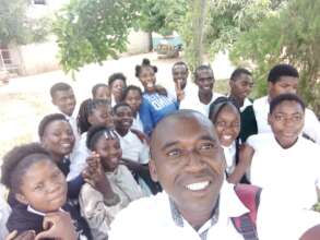 Project Manager Killian visiting pupils at Mabwize