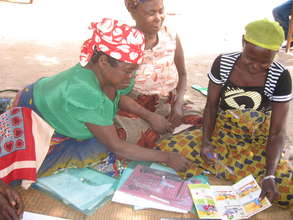 Traditional Midwives Reviewing Training Materials