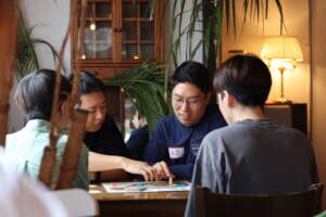 A staff running a program with an LGBTI youth.