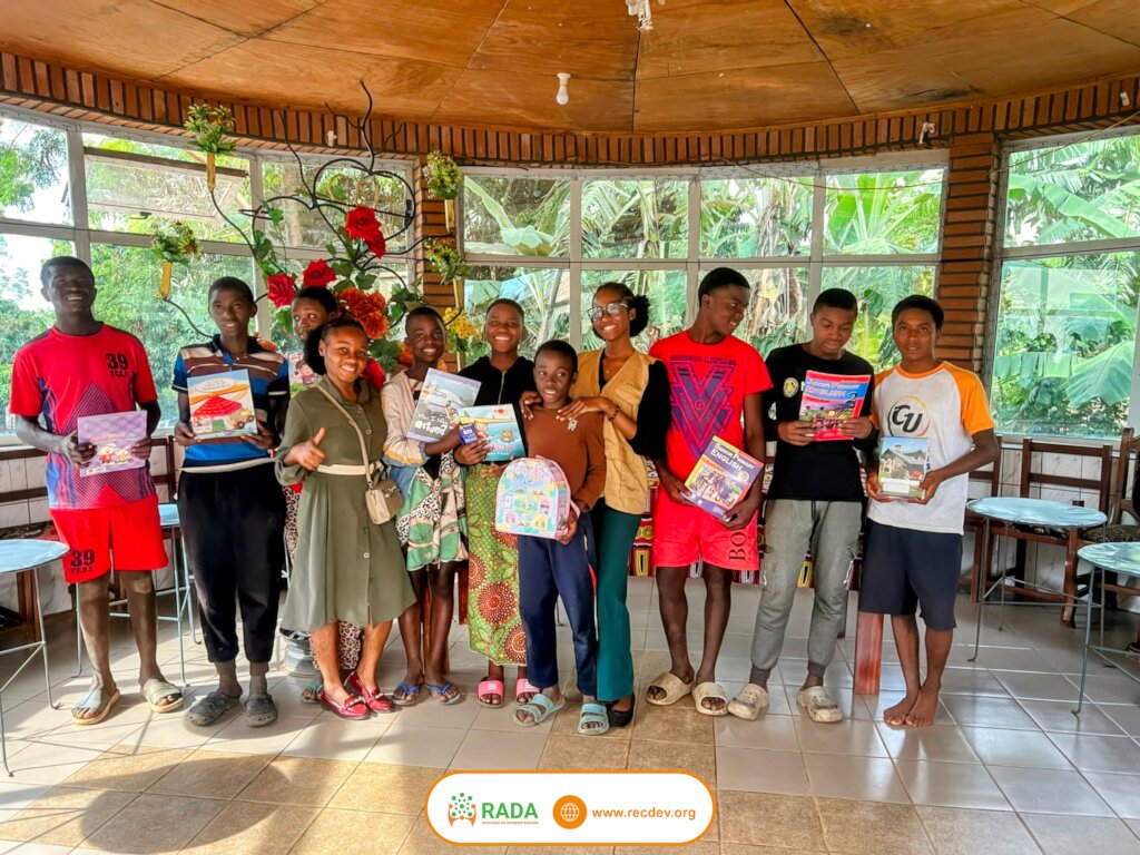Smiles on the faces of orphans holding their Gifts