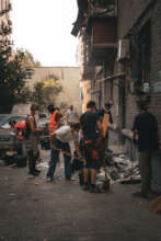 Volunteers Clearing Debris After Russian Attack