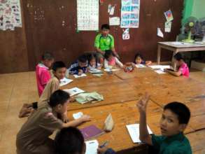 Teacher Somboon during an English beginners class