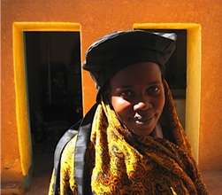 Aisha models a new hat prototype.
