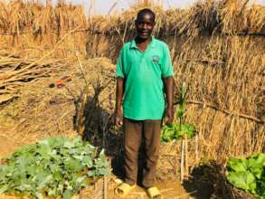 Beneficiary with his backyard garden