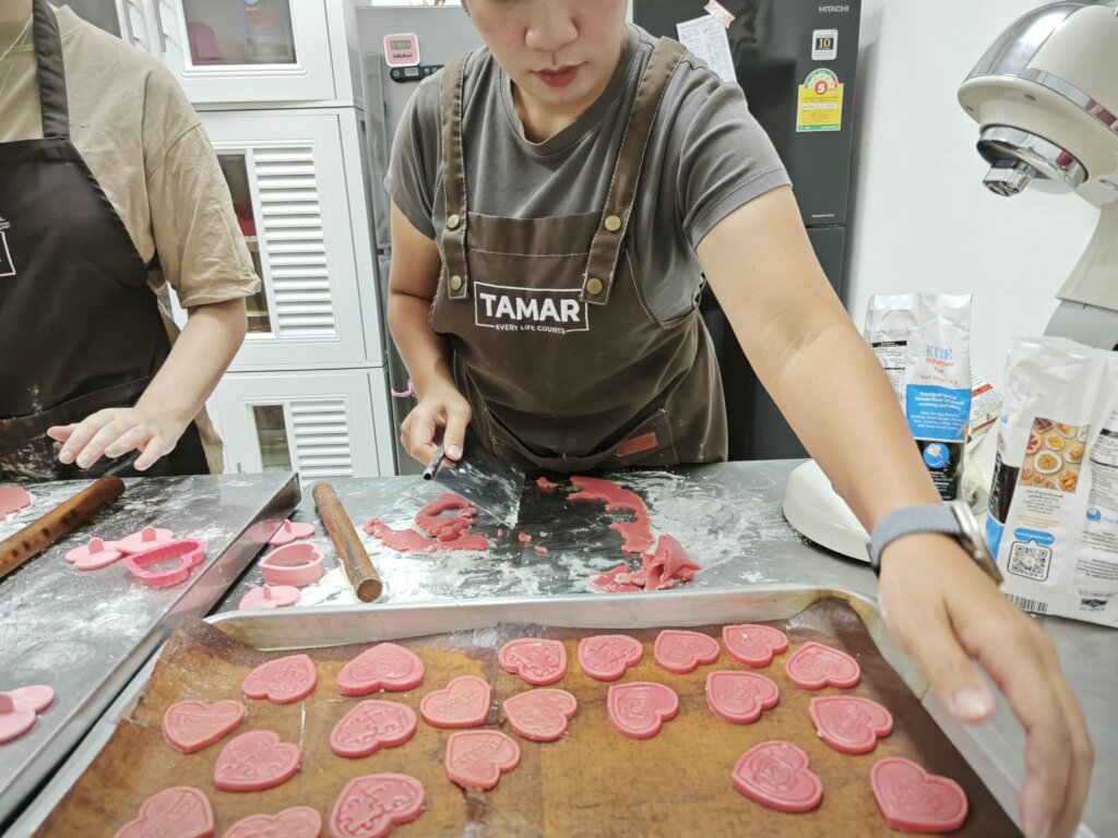 Our Team baking more than 2500 cookies for the bag