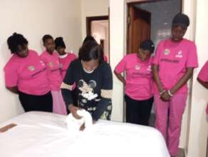 the trainer teaching the women