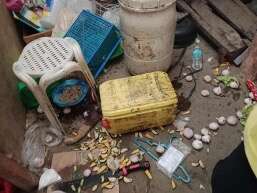 Muddied store goods scattered after quake damage
