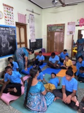 Older children getting ready for a yoga session