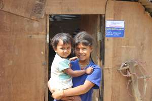 Children in front of temporary shelter