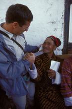 Dr. Tabin with a patient. Photo by Michael Amendolia.