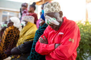 Hussein waits for the bandages to be removed.