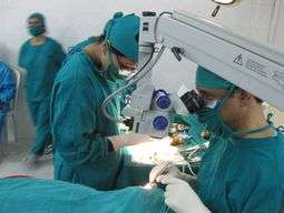 Dr. Paudel performing surgery