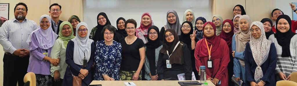 Tobi with students and faculty in Malaysia