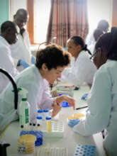 Dr. Tobi Nagel working with participants in Uganda