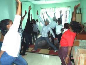 Scholars practicing yoga