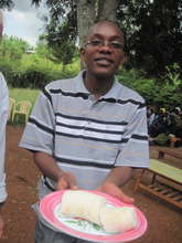 Michael with food made of cassava