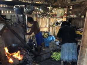 Cooking together as a family, Mrs. Lucy and Arnulf