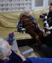 Home Visit Honoring an Elderly Mother