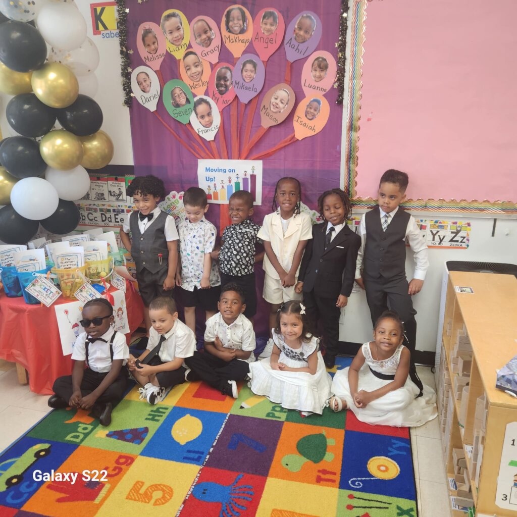 Image of children graduating from I-SEEED Academy