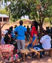 Community peace circle in rural Mozambique.