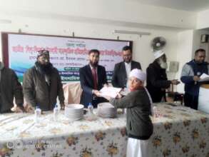 Receiving prize from District Commissioner
