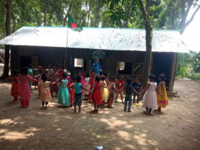 Children are playing in front of school.