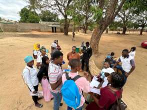 Community dialogue under the tree