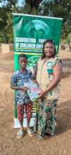 An orphan receives an article of clothing
