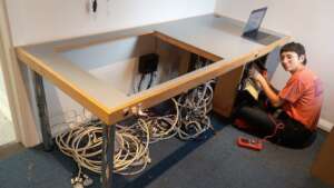 A volunteer helping to recycle our 2009 tx desk