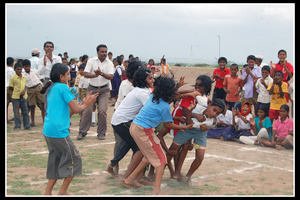 Girls playing "Team Sports (Holding Hands)" match