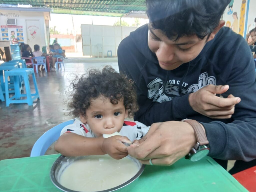 A young child being fed