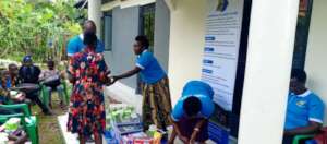 GIRL CHILD RECEIVES HE ITEMS.jpg
