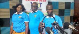 PLANE Staff Pose for a Photo After Radio Program