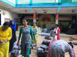 Teachers Prepare for Distribution of Uniform
