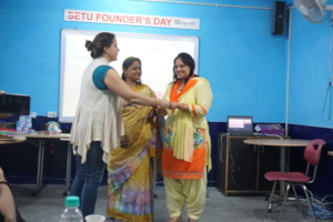 Teachers being awarded on Founder Day