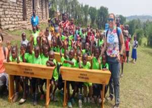 Children happy to receive Desks at their School