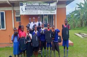 some children after receiving shoes and bags
